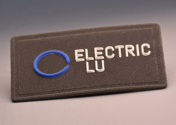 Αντανακλαστικές αποτυπωμένες σε ανάγλυφο αυξημένες ετικέτες μεταφοράς θερμότητας λογότυπων της 3M συνήθειας για την ενδυμασία