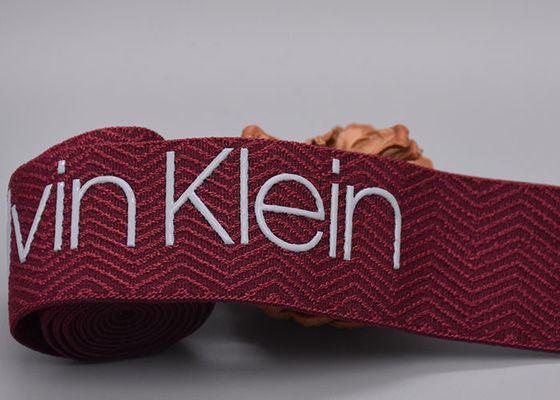 30mm τυπωμένη ελαστική ζώνη ενδυμάτων με το λαμπρό λογότυπο σιλικόνης